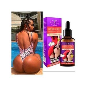 Aichun Beauty Garlic Hip Enlargement And Lifting Essential Oil,